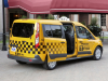 2014-ford-transit-connect-taxi-exterior-007-rear-three-quarters-with-sliding-door-open