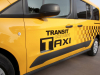 2014-ford-transit-connect-taxi-exterior-010-transit-connect-logo-on-front-door