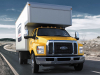 2018-ford-f-650-medium-duty-truck-exterior-004-yellow-moving-truck