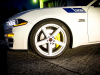 2019-ford-mustang-saleen-s302-white-label-ford-authority-garage-exterior-032-front-end-from-side-wheel-yellow-brake-caliper-s302-logo-decal