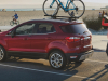 2020-ford-ecosport-exterior-011-titanium-rear-three-quarters-bike-on-roof-beach