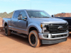 2020-ford-f-250-super-duty-lariat-with-sport-package-exterior-003-silver-front-three-quarters-first-drive