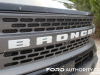 2021-ford-bronco-sport-badlands-fa-garage-exterior-018-bronco-logo-badge-on-grille