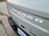 2021-ford-bronco-sport-cactus-gray-badlands-fa-garage-exterior-011-rear-badges