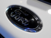 2021-ford-escape-sel-stealth-awd-package-oxford-white-2021-chicago-auto-show-exterior-015-black-ford-oval-logo-badge