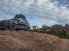 2021-ford-explorer-timberline-exterior-014-front-three-quarters-off-road-loaded-roof-rack
