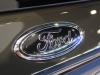 2021-ford-explorer-timberline-forged-green-2021-chicago-auto-show-exterior-022-black-ford-badge-logo-on-liftgate
