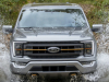 2021-ford-f-150-lariat-tremor-exterior-019-front-end-driving-through-water