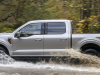 2021-ford-f-150-lariat-tremor-exterior-022-side-profile-driving-through-water