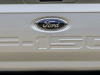 2021-ford-f-150-lariat-tremor-exterior-028-rear-end-tailgate-ford-logo-f-150-deboss