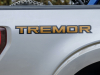 2021-ford-f-150-lariat-tremor-exterior-034-side-of-box-tremor-logo