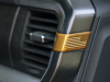 2021-ford-f-150-lariat-tremor-interior-004-usa-flag-with-orange-accent-on-passenger-side-ac-vent