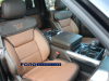 2021-ford-f-150-king-ranch-interior-front-row-011-max-recline-passenger-seat-center-console