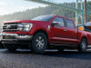 2021-ford-f-150-lariat-exterior-005-front-three-quarters-pulling-boat-out-of-lake