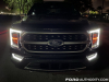 2021-ford-f-150-platinum-powerboost-fa-garage-night-exterior-001-front-headlights-drls