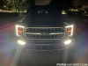 2021-ford-f-150-platinum-powerboost-fa-garage-night-exterior-003-front-headlights-drls-fog-lights