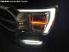 2021-ford-f-150-platinum-powerboost-fa-garage-night-exterior-012-front-headlight-drl-fog-light-driver-side