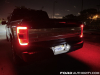 2021-ford-f-150-platinum-powerboost-fa-garage-night-exterior-017-rear-tail-lights