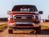 2021-ford-f-150-xlt-high-rapid-red-metallic-tinted-clearcoat-exterior-002-front