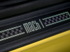 2021-ford-mustang-mach-1-europe-interior-grabber-yellow-007-mach-1-logo-on-door-sill