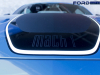 2021-ford-mustang-mach-1-exterior-velocity-blue-008-mach-1-logo-on-hood-striping