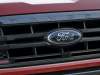 2021-ford-ranger-tremor-lariat-exterior-019-grille-with-ranger-script-red-nostrile-accents-ford-logo
