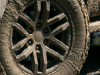 2021-ford-ranger-tremor-lariat-exterior-032-wheel-and-tire-in-mud