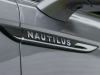 2021-lincoln-nautilus-reserve-silver-radiance-exterior-026-nautilus-logo-name-front-door