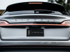 2021-lincoln-nautilus-reserve-silver-radiance-exterior-034-rear-end-tail-lamps-lincoln-logo-script
