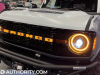 2022-ford-bronco-all-female-build-sema-2022-live-photos-exterior-003-grille-bronco-script-grille-drl-daytime-running-lights-headlights