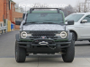 2022-ford-bronco-everglades-prototype-spy-shots-december-2021-exterior-001-front-headlamp-winch-snorkel-roof-rack