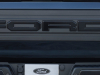 2023-ford-f-150-raptor-r-press-photos-exterior-025-antimatter-blue-rear-tailgate-ford-script-logo-r-logo