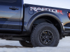 2023-ford-f-150-raptor-r-press-photos-exterior-029-antimatter-blue-raptor-r-logo-on-box-outers-wheel