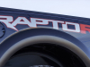 2023-ford-f-150-raptor-r-press-photos-exterior-030-antimatter-blue-raptor-r-logo-on-box-outers