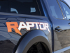2023-ford-f-150-raptor-r-press-photos-exterior-031-antimatter-blue-raptor-r-logo-on-box-outers