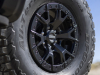 2023-ford-f-150-raptor-r-press-photos-exterior-033-antimatter-blue-front-wheel-and-tire