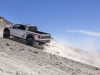 2023-ford-f-150-raptor-r-press-photos-exterior-054-avalanche-gray-side-rear-three-quaters