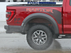 2021-ford-f-150-raptor-35-inch-tire-graphics-package-live-photos-014-rear-three-quarters-box-decals-raptor-script-fp-ford-performance-gn-generation-03-usa-flag