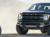2021-ford-f-150-raptor-exterior-004-code-orange-and-agate-black-raptor-37-performance-package-front-three-quarters