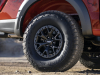 2021-ford-f-150-raptor-exterior-073-code-orange-raptor-37-performance-package-side-trail-graphics-on-side-of-box-37-inch-tire-and-beadlock-wheel