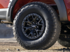 2021-ford-f-150-raptor-exterior-074-code-orange-raptor-37-performance-package-side-trail-graphics-on-side-of-box-37-inch-tire-and-beadlock-wheel