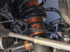 2021-ford-f-150-raptor-exterior-083-coil-front-suspension-with-fox-shocks-orange
