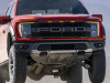 2021-ford-f-150-raptor-exterior-086-code-orange-raptor-37-performance-package-front-three-quarters-jumping