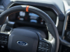 2021-ford-f-150-raptor-interior-010-cockpit-steering-wheel-orange-12-oclock-marker-ford-logo