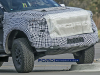 2021-ford-f-150-raptor-spy-shots-exterior-grille-004-front-end-running-over-curb-towing