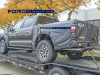 2021-ford-f-150-raptor-spy-shots-exterior-loaded-onto-flatbed-october-2020-003-rear-three-quarters