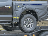 2021-ford-f-150-raptor-spy-shots-exterior-loaded-onto-flatbed-october-2020-007-rear-end-rear-wheel-and-tire