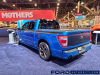2022-ford-f-150-street-performance-concept-sema-2021-live-photos-exterior-004-rear-three-quarters-hood-open-undercover-black-hard-folding-tonneau-bed-cover