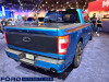 2022-ford-f-150-street-performance-concept-sema-2021-live-photos-exterior-006-rear-three-quarters-f-150-deboss-black-applique-on-tailgate-dual-exhaust-undercover-black-hard-folding-tonneau-bed-cover