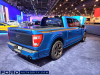2022-ford-f-150-street-performance-concept-sema-2021-live-photos-exterior-007-rear-three-quarters-f-150-deboss-black-applique-on-tailgate-dual-exhaust-undercover-black-hard-folding-tonneau-bed-cover